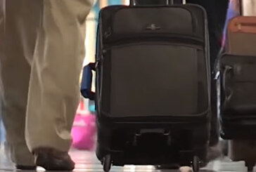 Ergonomic Strategies for Using a Suitcase