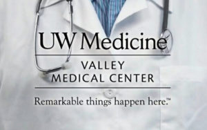 UW Medicine/Valley Medical Center logo over lab coat that says "Remarkable things happen here."