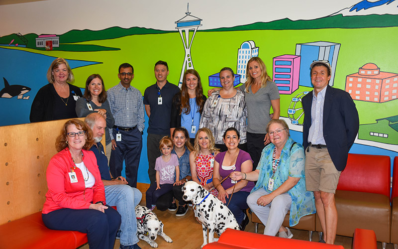 Ferries and Whales and Space Needle, Oh My! Children’s Therapy Reception Room Murals Dedicated
