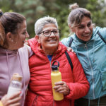 Happy,Multiracial,Women,With,Different,Generation,Having,Fun,During,Trekking