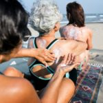 Senior,Women,Applying,Sunscreen