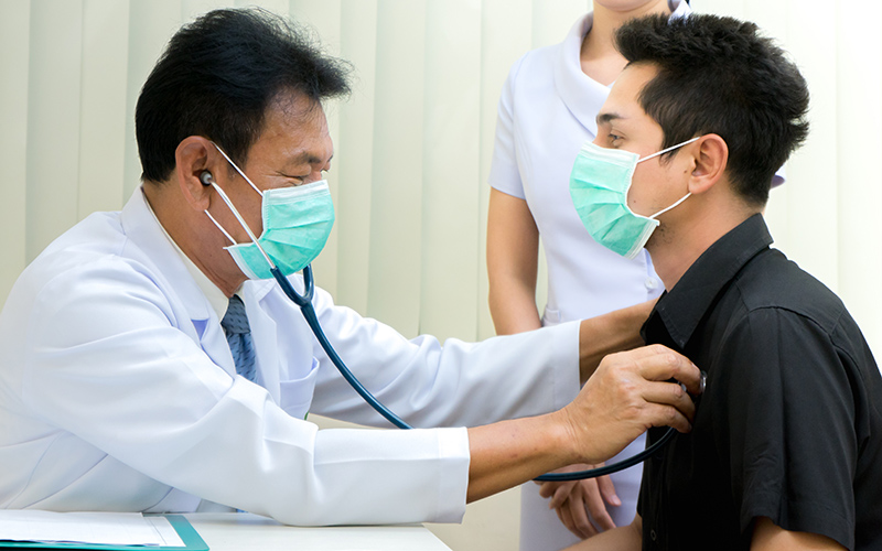 Senior,Asian,Doctor,Examining,Male,Patient,In,The,Hospital.doctor,Listening