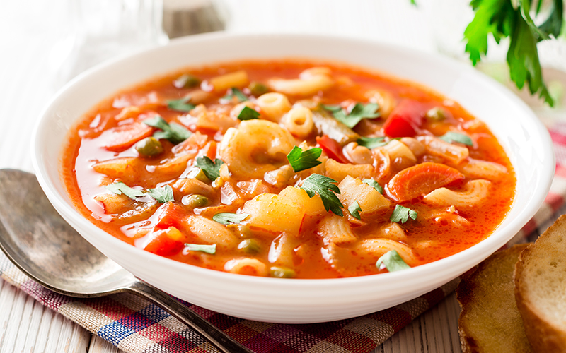 Italian,Minestrone,Soup,On,White,Wooden,Background.,Selective,Focus.